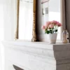 French country concrete fireplace mantel